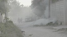 burning trash on the streets of Haiti 