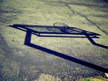 shadow of a basketball hoop 