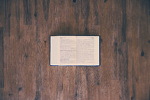 open Bible on a floor 