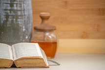 honey and pages of an old book 