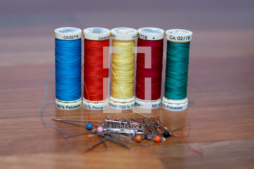 Row of Sewing Threads with Pins