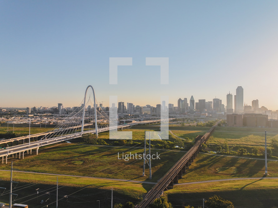 Aerial view of the Margaret Hunt Hill Bridge in downtown Dallas, Texas on a beautiful clear blue sky morning