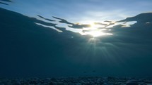 Sun reflection underwater in the ocean