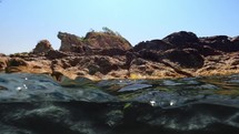 Half underwater of a sea cliff 