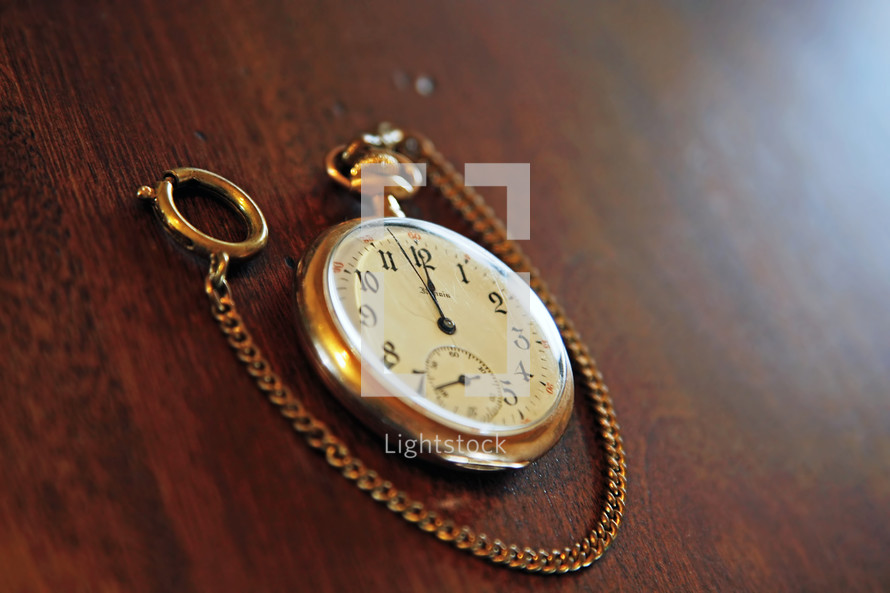 Vintage Pocket Watch on Wood (Shallow Depth of Field)
