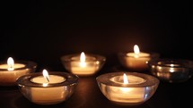 Tea light candles in glass votives