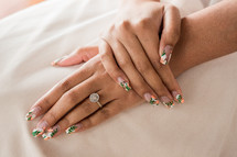 bride with fancy finger nails 
