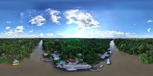 360 aerial photo taken with drone of restaurants on small river in middle of Combú Island in Belém, Pará, Brazil