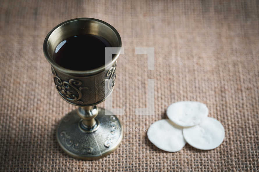 Small chalice and wafers for communion