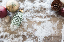 pine cone ornaments in snow 