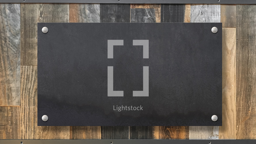 Metal Sign on Wood Background