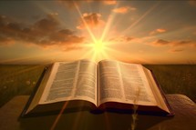 Open Bible with Sunrise Light