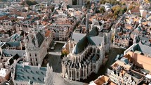 Scenic St. Peter's Church in Leuven Grote Markt - Aerial Fly-over