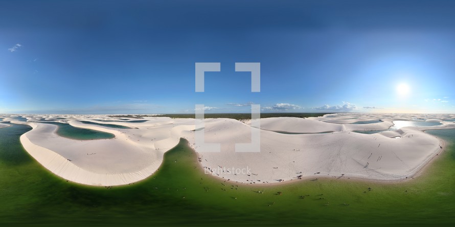 360 aerial photo taken with drone of Lagoa Bonita in the expansive sand dunes Lençóis Maranhenses National Park in Maranhão, Brazil