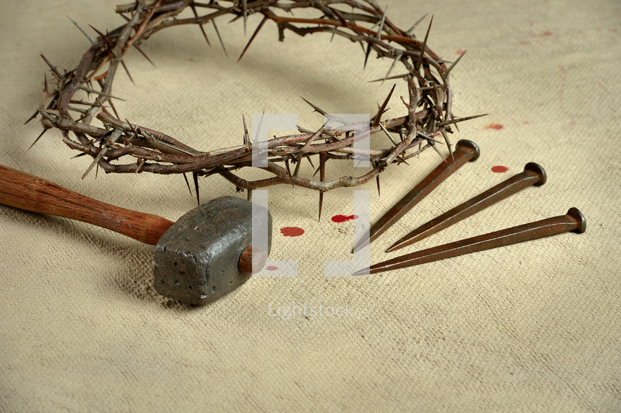 crown of thorns, mallet, nails 