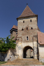 Entrance to the fortified Lutheran evangelical church in Bagaciu, Romania