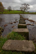 Stepping stones on a public footpath crossing the River Hodder near The Inn at Whitewell, Lancashire, England, United Kingdom