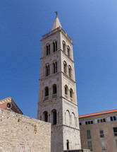 Cathedral of Saint Anastasia in Zadar, Croatia has an attached belltower built in the Romanesque architecture style