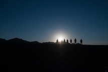 silhouette of a group of people 