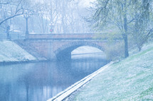 bridge with falling snow 