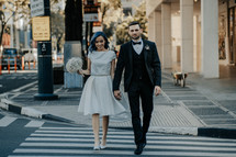bride and groom in a city 