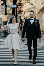 portrait of a bride and groom in a city 