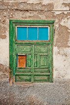 old green window in Tenerife, Spain