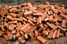 a pile of old bricks, earthquake rubble 