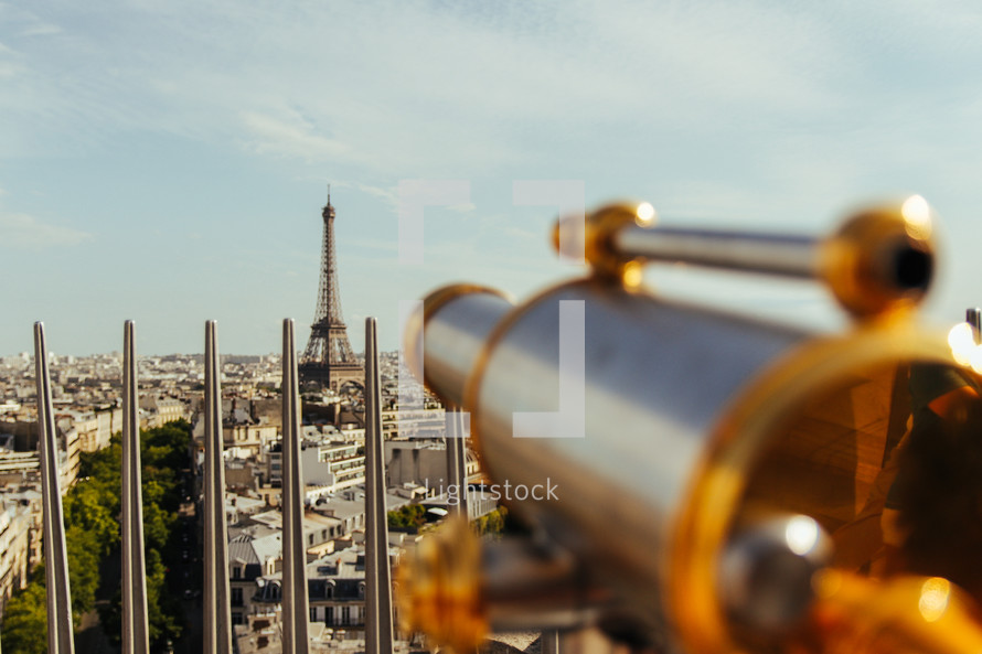 telescope pointing to Eiffel Tower and Paris streets 