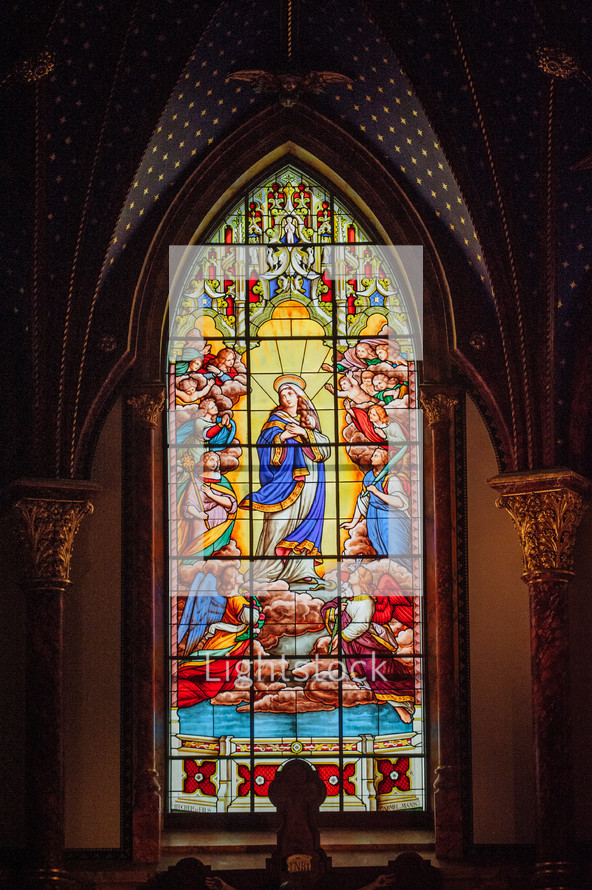 stained glass window of Mary