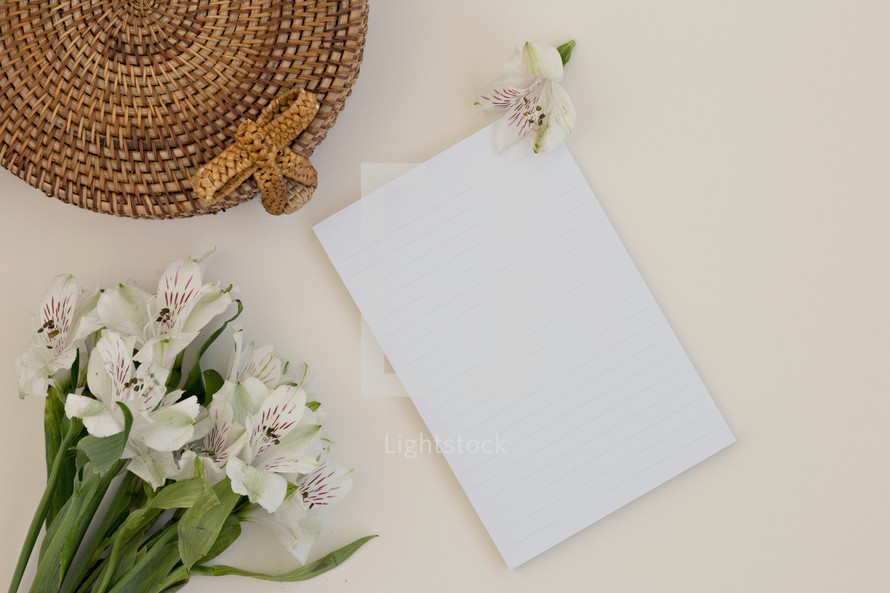 flowers and blank white paper 