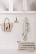 hooks in a mudroom 