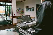 DJ with sound equipment 