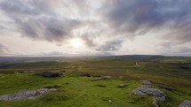 Clouds Moving Across Dartmoor Hills As Sun Begins To Set Sheep Grazing