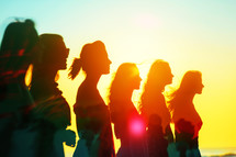 Silhouettes of women in the summer