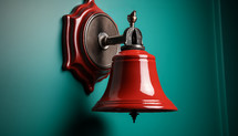 Red school bell on the wall