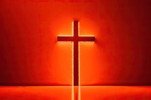 A Glowing Cross on Red Background