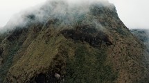 Fine Clouds Moving Over Andes Mountaintop In Cayambe Coca National Park In Papallacta, Ecuador. Aerial Drone Shot
