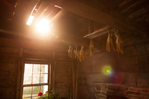 sunlight through a window into an old farm house 