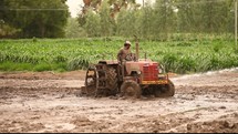 tractor plowing a field 