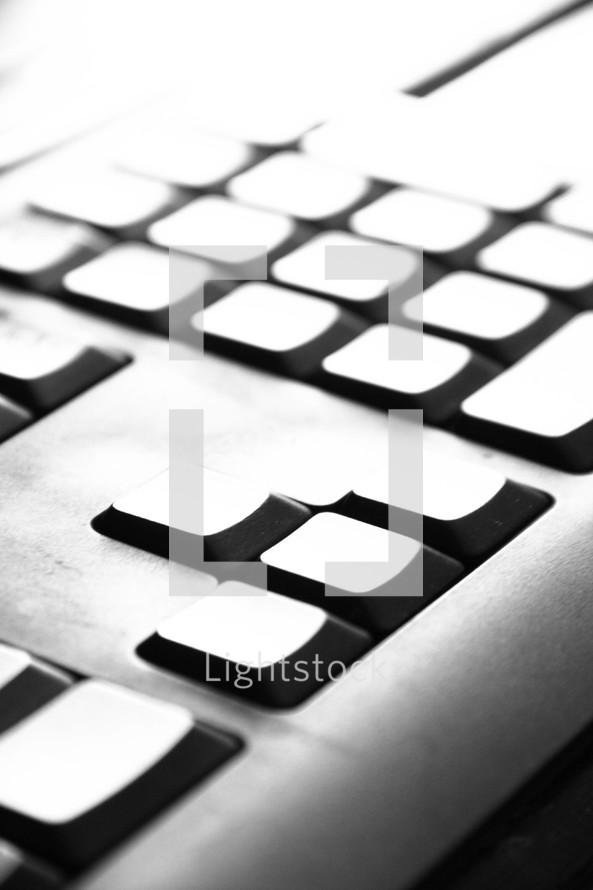 Light and shadows on a computer keyboard.