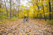 bike on a dirt road in fall 