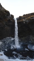 Waterfall Falling In The Pond In Iceland State