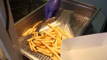 scooping french fries 