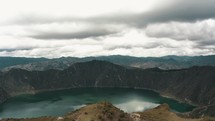Landscape Of The Quilotoa Volcanic Lake In Ecuador - aerial shot	