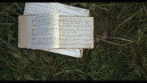 hymnal in the grass