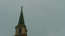 steeple and moving clouds 