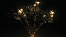 Brightly colorful fireworks for New Year and other events celebration on dark background. Seamless looping 4k