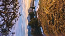 Vertical Time-lapse of spring alpine mountains country at beautiful sunset under tree Social media story Panorama
