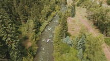 aerial view over white water rafters 